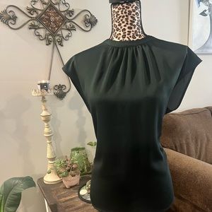 Classy dark green sleeveless top